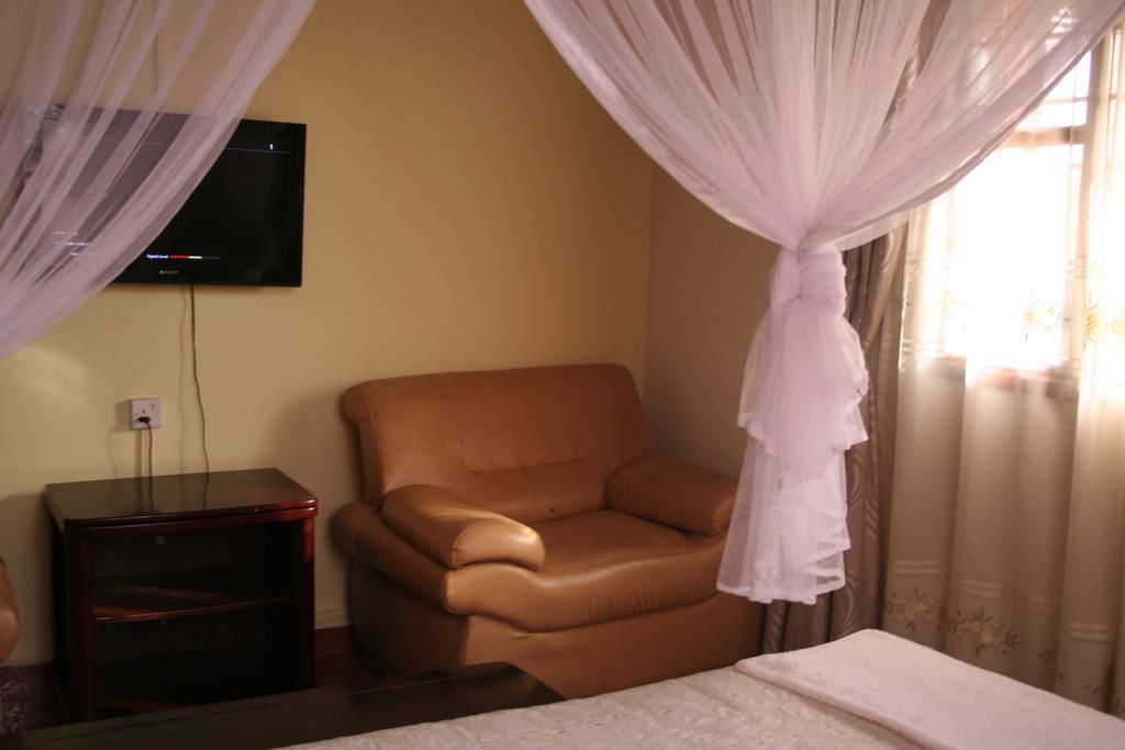 Hotel Acacia Kampala Quarto foto