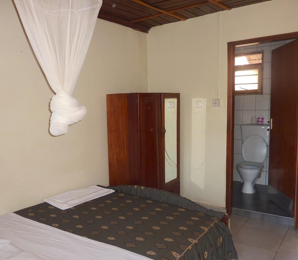 Hotel Acacia Kampala Quarto foto